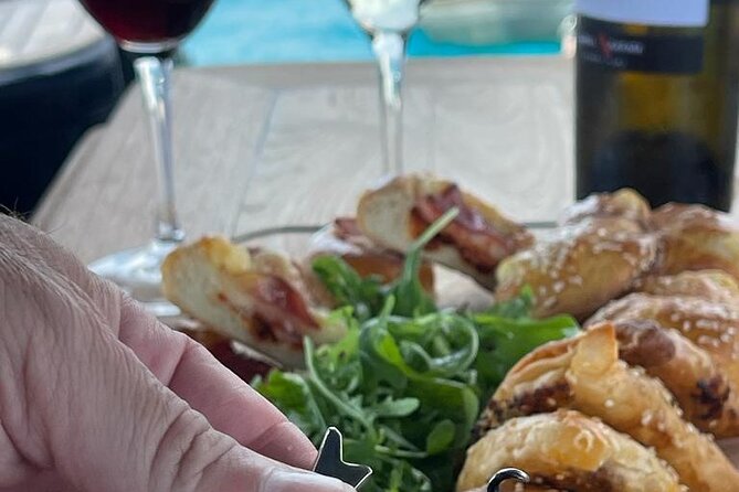 Greek Gastronomy & Wine Pairing Cruise with a Sommelier in Athens - Music, conversation, and the small-group mood