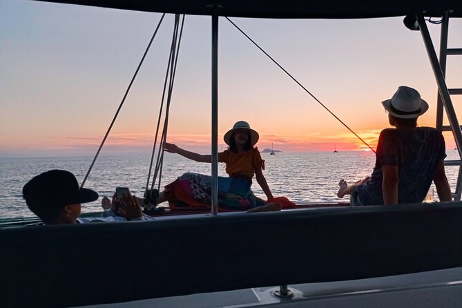 Half-Day Exclusive Catamaran Cruise in Santorini with Meal and Open Bar - Thirassia, snorkeling, and lunch from the galley