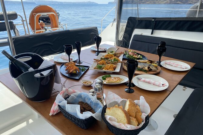 Half Day Premium Catamaran Cruise in Santorini including Oia - Thirassia brings the longest pause