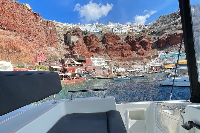 Half Day Premium Catamaran Cruise in Santorini including Oia - Oia and Ammoudi Bay depend on the sailing time