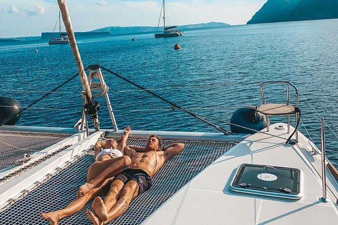 Half Day Premium Catamaran Cruise in Santorini including Oia - The Venetian lighthouse and the sunset finish