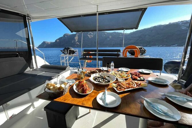 Half Day Premium Catamaran Cruise in Santorini including Oia - Warm water near Santorini Volcano