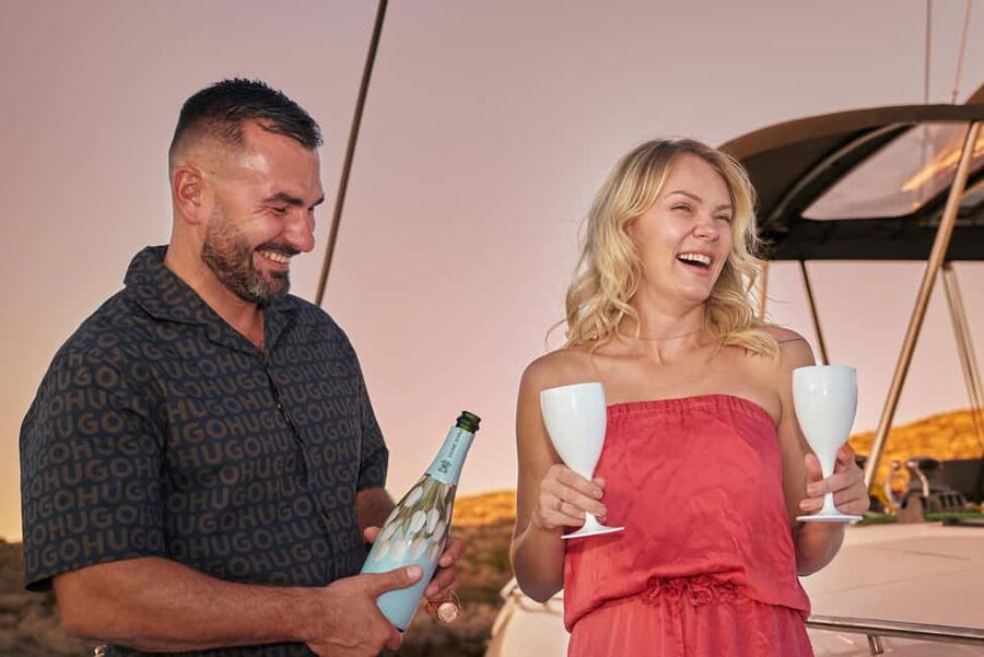Hersonissos: Sunset Catamaran Cruise with Snacks and Drinks - A sunset cruise with more than a postcard view