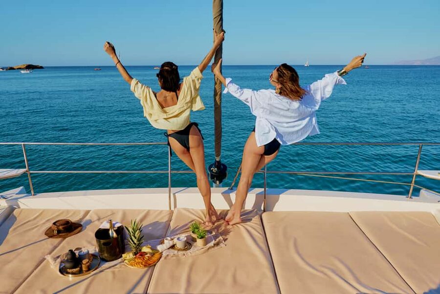 Hersonissos: Sunset Catamaran Cruise with Snacks and Drinks - Snacks, drinks, and the question of dinner