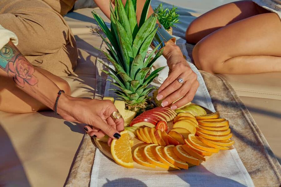 Hersonissos: Sunset Catamaran Cruise with Snacks and Drinks - Crew care, seasickness, and comfort
