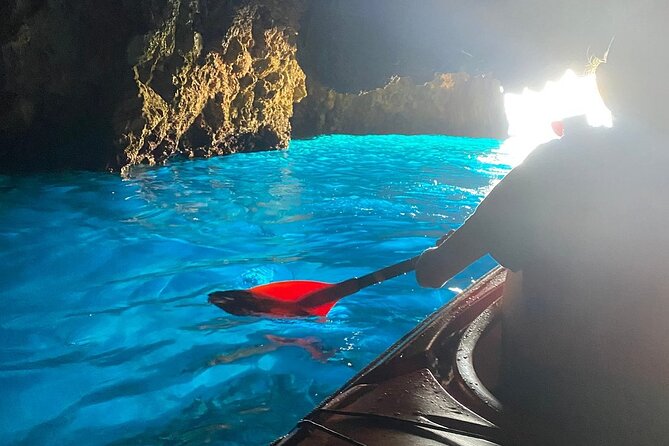Kayak Trip to Hidden blue Cave, with lunch & fruits. - Swimming at remote beaches