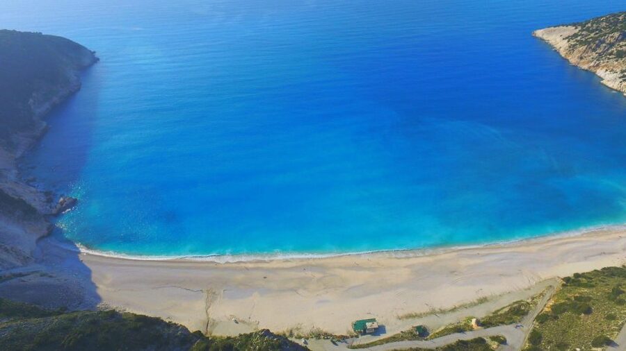 Kefalonia: Island Highlights Bus and Boat Tour with Lunch - The coastal cruise and secluded swimming stop