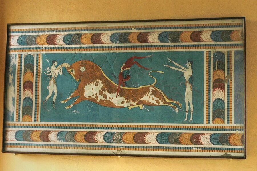 Knossos Palace Skip-the-Line Ticket & Private Guided Tour - Restored walls, ancient remains, and the problem of interpretation