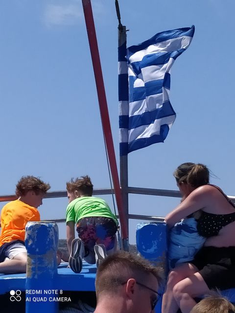 Kos: Kefalos Bay Boat Cruise with Fishing, Swimming, & Meal - Swimming at a secluded, stony beach