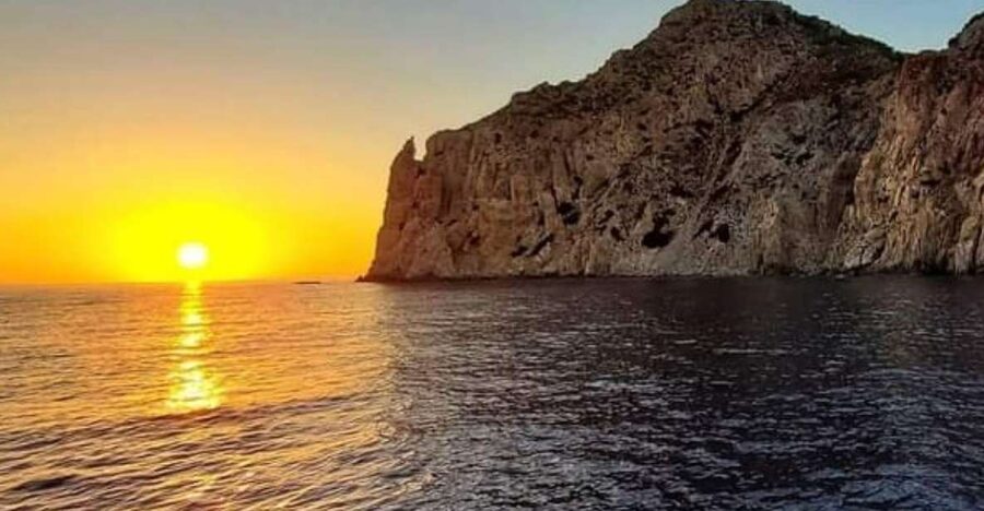 Kos: Sunset Cruise with Swimming and BBQ Dinner - Reaching the secluded beach