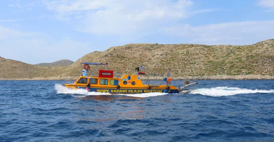 Kos Town: Glass-Bottom Boat Cruise with Swimming Stops - Seating, sun, shade, and choppy water