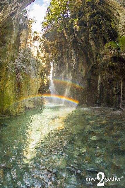 Kourtaliotiko Gorge: Snorkel Trip to the Waterfalls - Wading through springs toward the waterfall lagoon