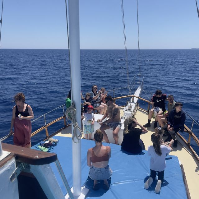 Lindos: Rhodes South-East Coast Cruise with Swim Stops - Four swim stops, a calm boat, and a useful lunch break
