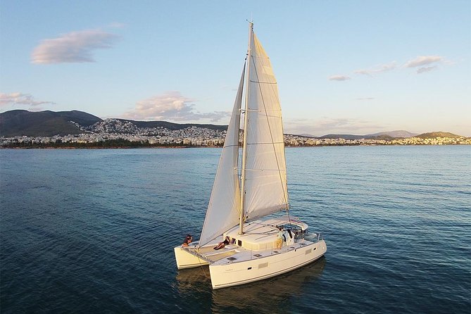 Luxury Catamaran Cruise from Athens with Traditional Greek Meal and BBQ - The return sail and sunset option