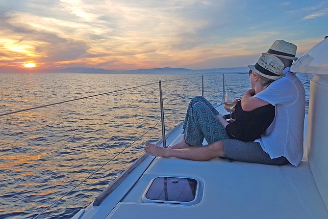 Luxury Catamaran Cruise from Athens with Traditional Greek Meal and BBQ - The first swimming stop, with towels ready