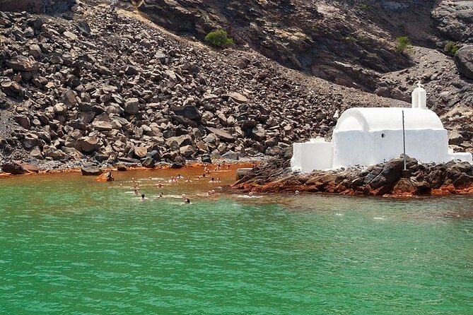 Luxury Small-Group Catamaran Cruise with BBQ, Open bar & Transfer - Indian Rocks and the volcanic coastline