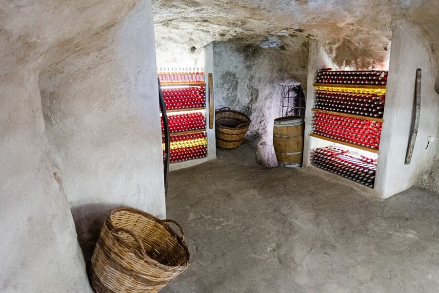 Milos Island: Kostantakis Winery Wine Tasting Experience - Entering the natural cave cellar
