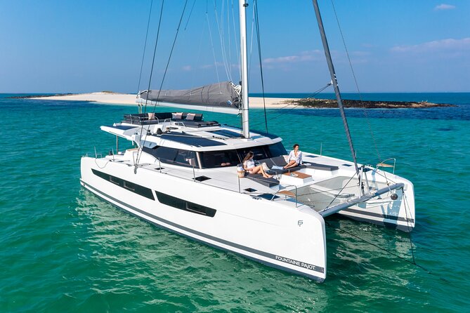 Mykonos: Brand-New Catamaran Cruise with Meal, Drinks & Transport - A possible look at Delos from the water