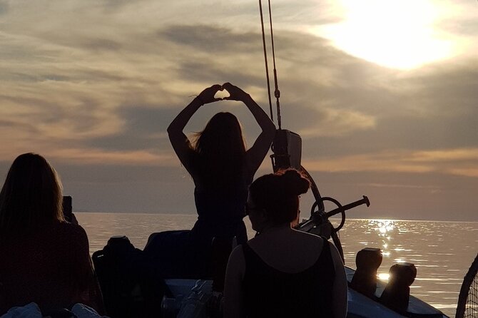 Mykonos: Sunset Cruise with Drinks - The anchor point and the sunset itself