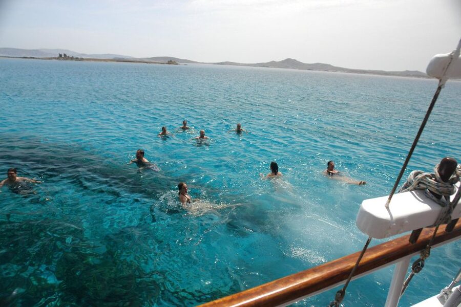 Mykonos: Sunset Party Boat Cruise with 1 Drink - The Agios Stefanos swim stop