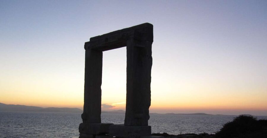Naxos Castle Walking Tour and Sunset at the Portara - Starting at a local shop in Naxos Town