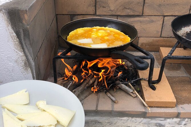 Naxos Perivoli Farm Experience & Wood-fire Cooking Class - Cooking Naxian food over a wood fire