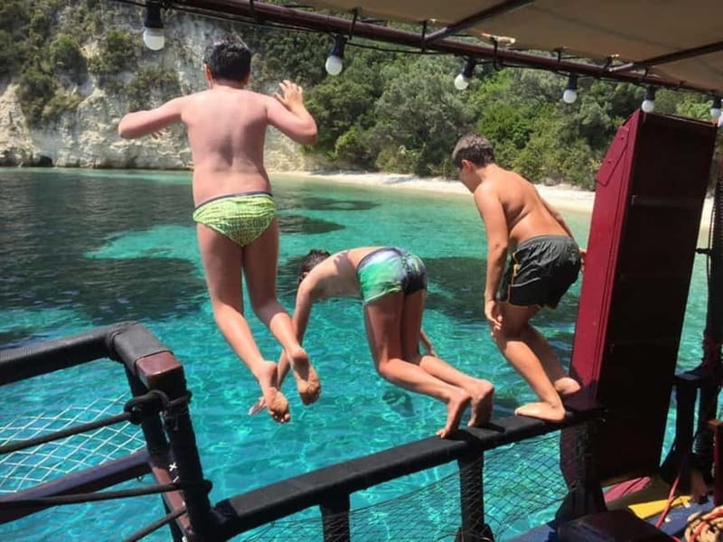 Nydri: Full-Day Wooden Boat Cruise with BBQ & Drinks - Spartochori, a small village with a church visit