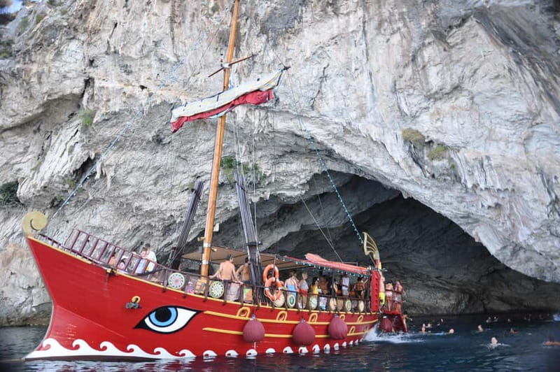 Nydri: Full-Day Wooden Boat Cruise with BBQ & Drinks - Passing Skorpios and the final swim