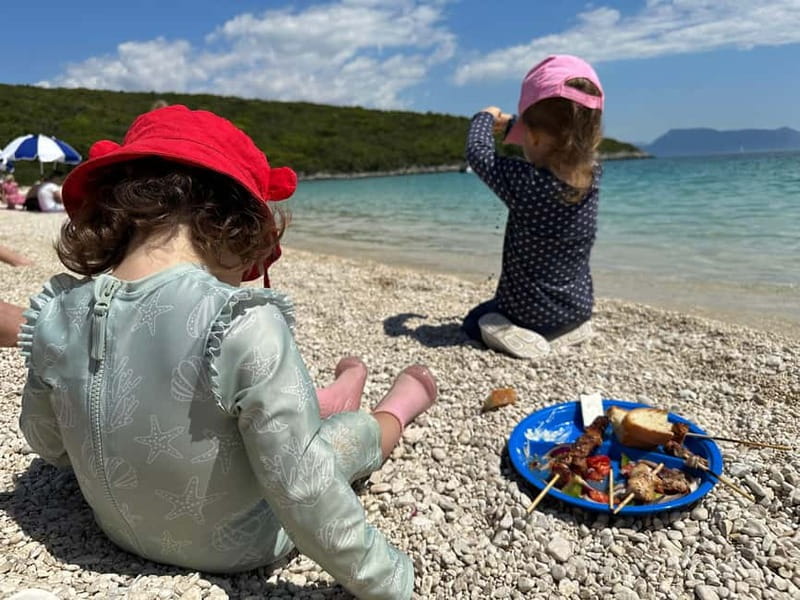 Nydri: Island Hopping Boat Cruise with Beach BBQ Lunch - Skorpios closes the day with stories and one more swim