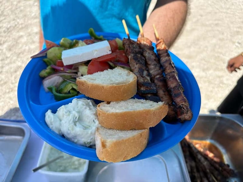 Nydri: Island Hopping Boat Cruise with Beach BBQ Lunch - Papanikolis Cave makes the early start worthwhile