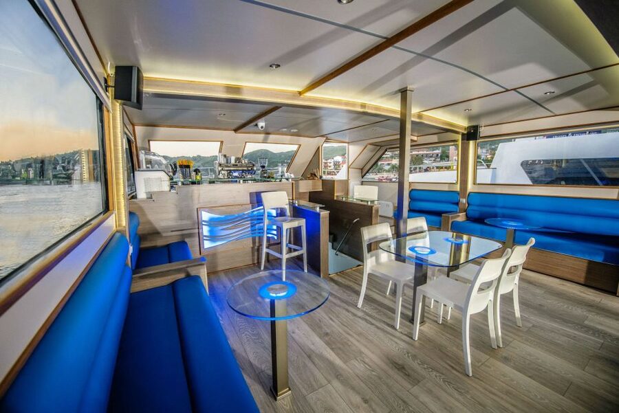 Ouranoupoli: Mount Athos Sightseeing Glass-Bottom Boat Tour - Food, drinks, music, and comfort onboard