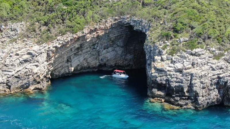 Paleokastritsa: Paradise, Yali Beach, & Blue Caves Boat Tour - The 175hp ride along the west coast