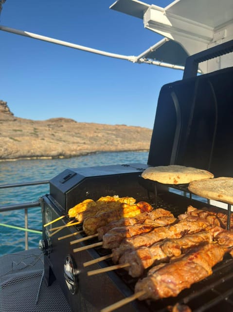 Porto Rafti: Athens Cruise Tour with Mediterranean BBQ - Four swimming stops in East Attica
