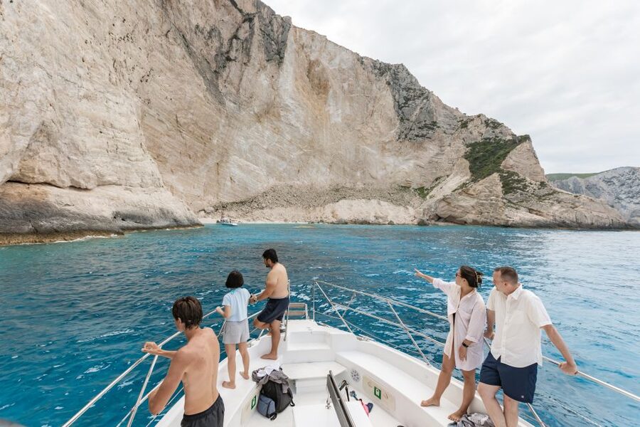 Porto Vromi: Navagio Shipwreck Beach & Blue Caves by Boat - What the crew adds to the trip