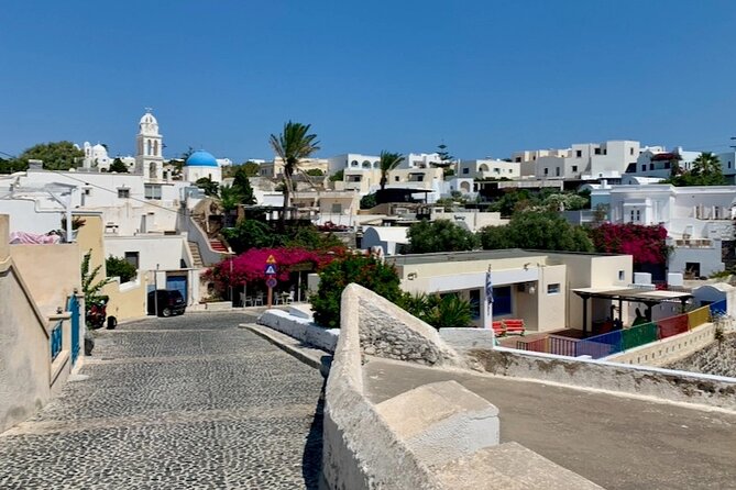 Private Day Trip to Santorini from Athens: Sightseeing Highlights - Perivolos: black sand and a slower hour