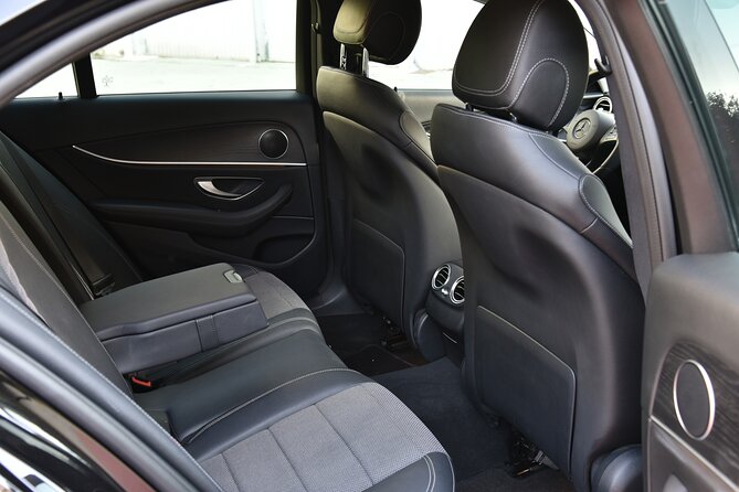 Private Limo Transfer From ATH Airport To Athens/Pireaus/Suburbs - Riding in a private Mercedes vehicle