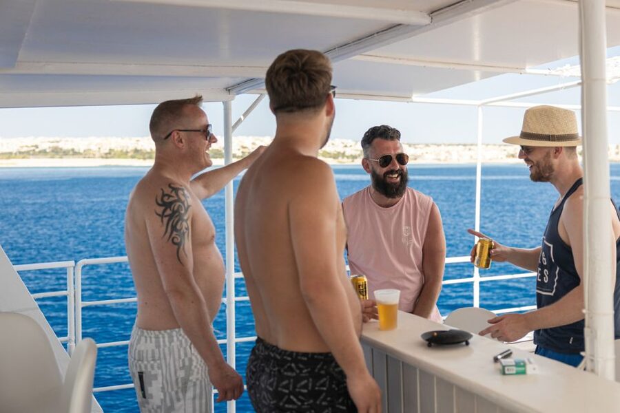 Rhodes: Bay to Bay Swim Cruise with Greek Buffet and Wine - A Greek buffet served at sea