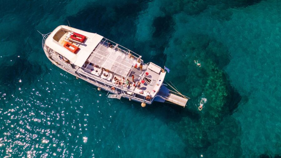 Rhodes: Bay to Bay Swim Cruise with Greek Buffet and Wine - Anthony Quinn Bay and the liveliest stop