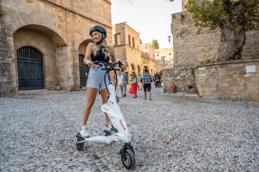 Rhodes: City Highlights and Medieval Town Trikke Tour - Entering the medieval walls and moat