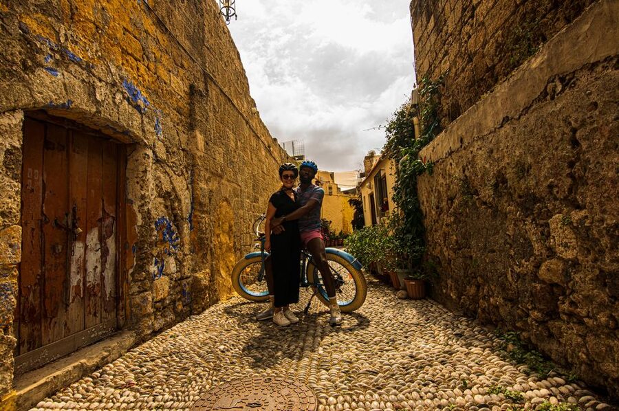 Rhodes: E-bike Highlights Sunset or Morning Photo Tour - Entering Rhodes Old Town through its medieval lanes
