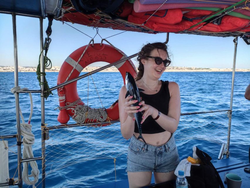 Rhodes: Fishing Trip, Snorkelling, BBQ, & Professional Guide - The fish BBQ is the real payoff