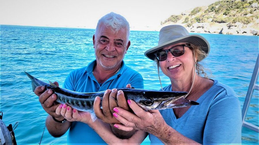 Rhodes: Fishing Trip, Snorkelling, BBQ, & Professional Guide - The boat, safety, and comfort onboard