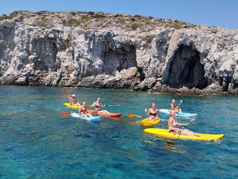 Rhodes: Gulet Trip with Food, Drinks, SUP, Kayak & Swimming - Greek lunch, fruit, wine, and soft drinks