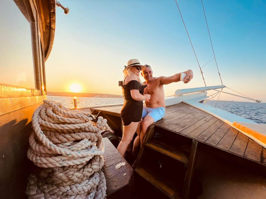 Rhodes: Sunset Cruise with Greek BBQ and Unlimited Drinks - One hour at Kallithea Springs