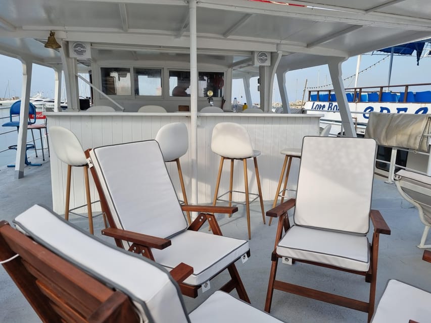 Rhodes: Sunset Cruise with Live Music, Wine & Greek Buffet - What you eat and drink for $53