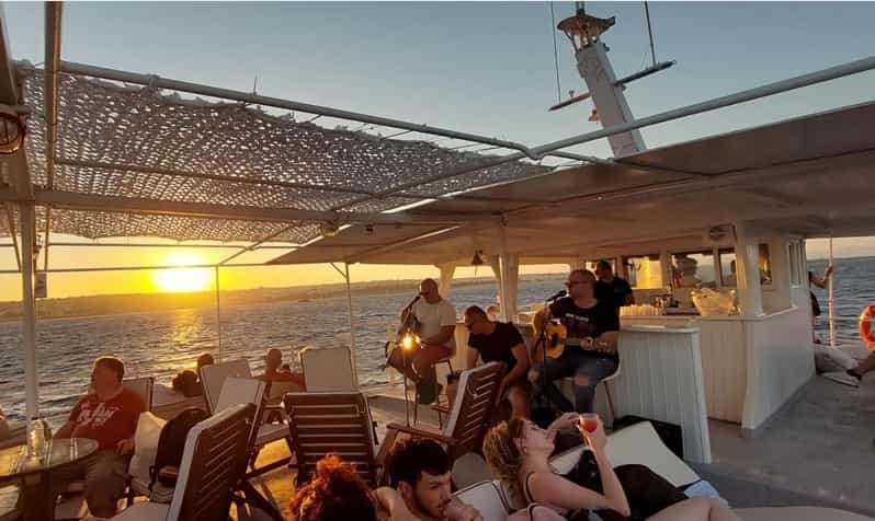 Rhodes: Sunset Cruise with Live Music, Wine & Greek Buffet - Who should book this Rhodes sunset cruise