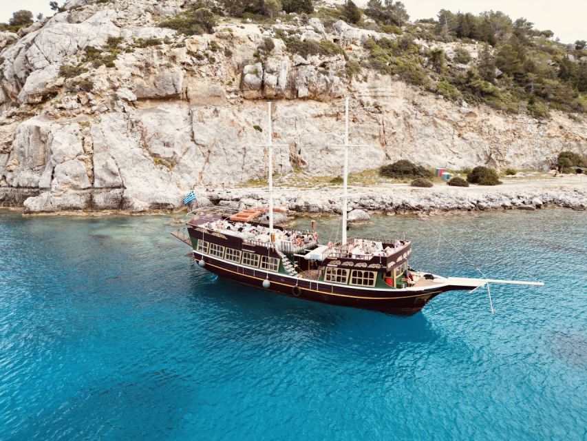 Rhodes: Sunset Cruise with Unlimited Aperol, Beer, and Wine - Leaving Mandraki Harbour in the early evening