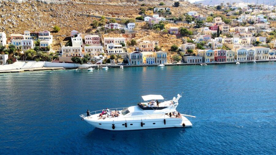 Rhodes: Symi Yacht Tour with Unlimited Drinks and Transfer - Starting at Mandraki and settling into the yacht