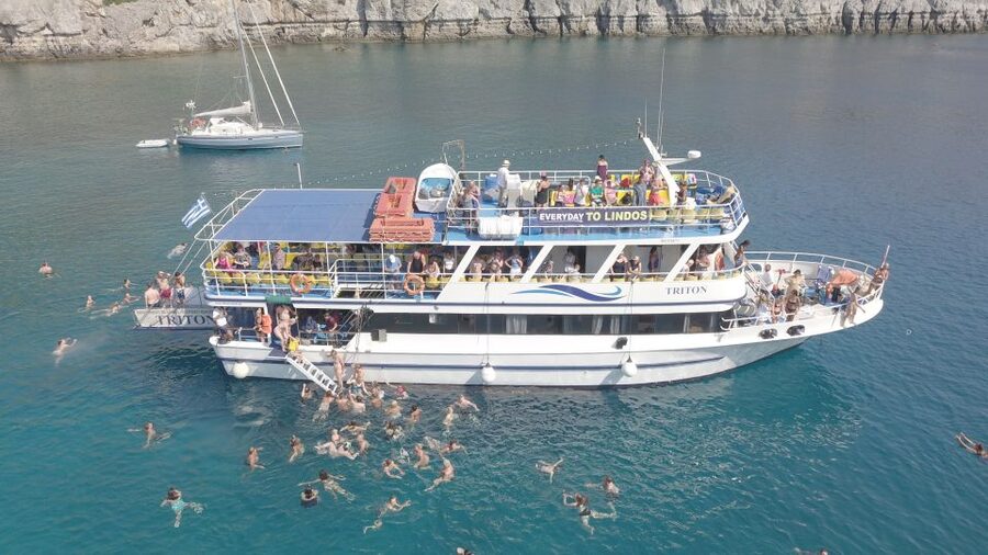 Rhodes Town: Scenic Cruise to Lindos with Swim Stops - Choosing between the Acropolis, beach, and lunch