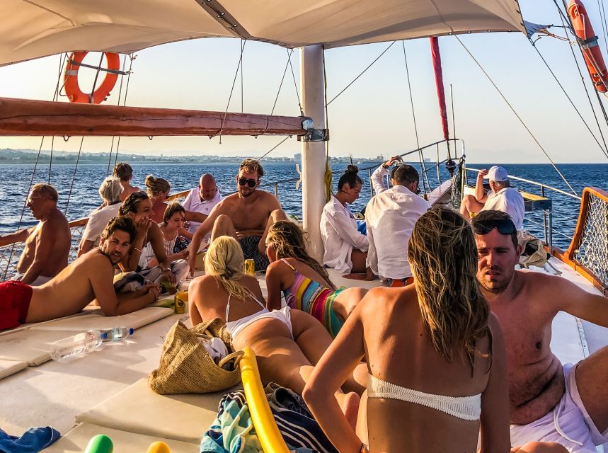 Rhodes Town: Sunset Boat Cruise with Drinks & Snacks - Swimming and snorkeling at Kallithea Springs